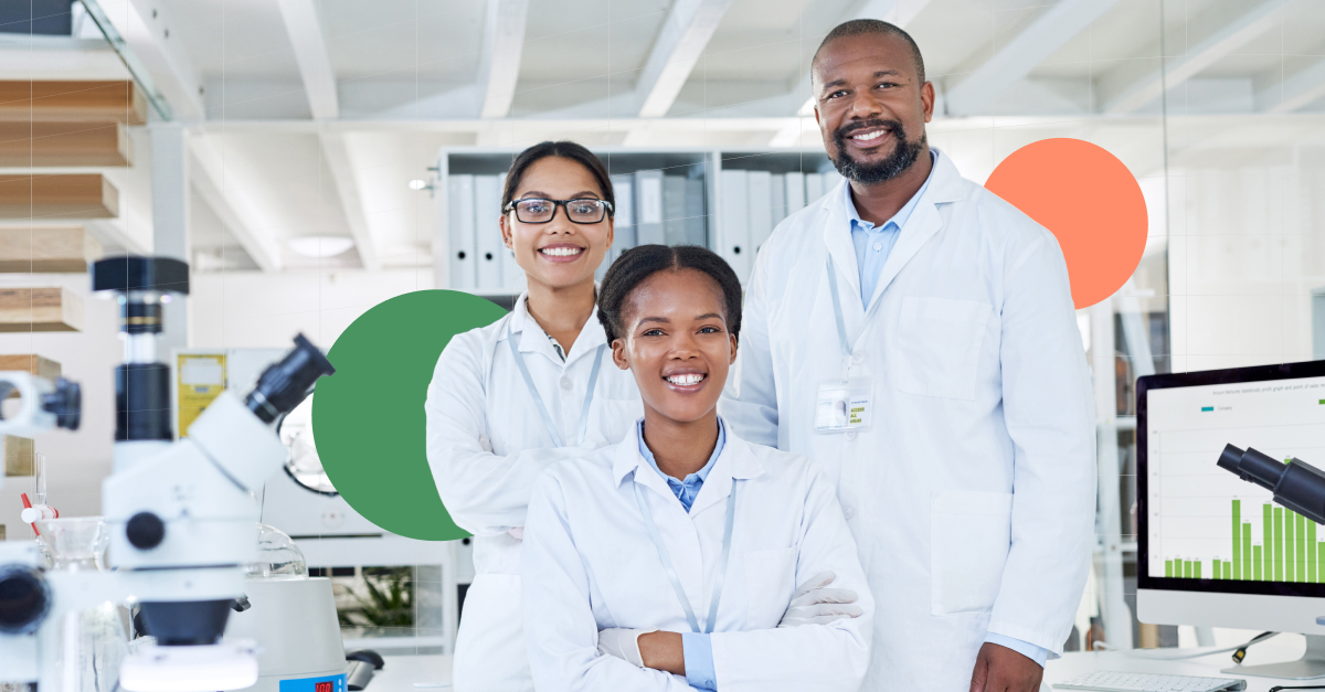 Three people wearing lab coats