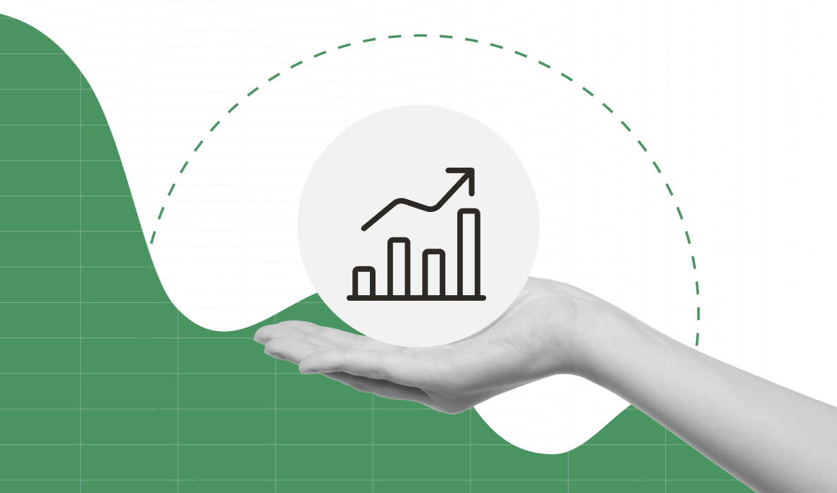 Icon of a bar chart with an upward arrow is in the palm of a finance professional's hand.
